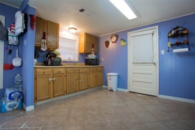 Kitchen on the 1st floor, lots of space for installing an island.