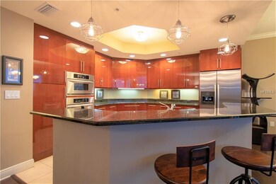 High gloss Brazilian cherry cabinets with built-in