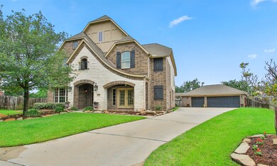 The long drive is great access to the 3 car detached garage and side entrance to the home