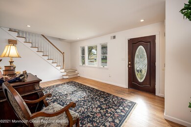 Greet your guests in a sunlit foyer!