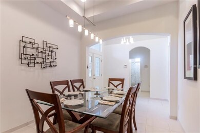 Dining room facing entrance and foyer area.