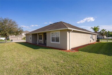 Rear elevation showing the covered lanai, gutters 