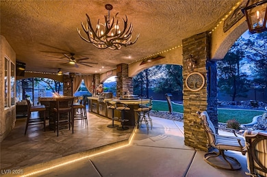 View of patio / terrace featuring outdoor dry bar