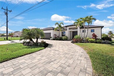 View of front of home featuring a garage and a fro
