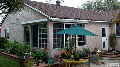 West  side view of the house from backyard