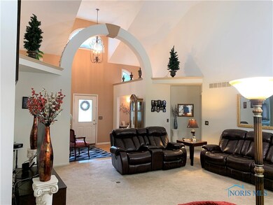 Family room with vaulted ceiling