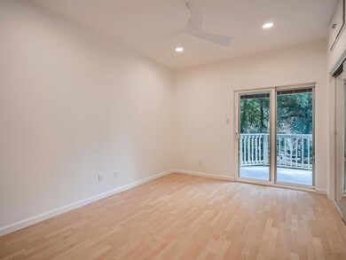 Empty room featuring light wood-style flooring, c