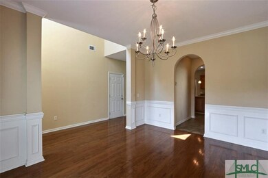 Formal dining room finished nicely with wainscotin