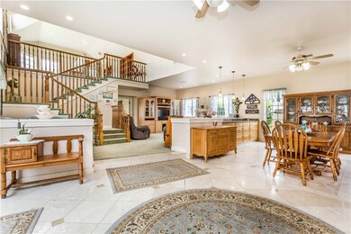 Huge Open Floor Plan with Limestone Floors and Raised Ceilings