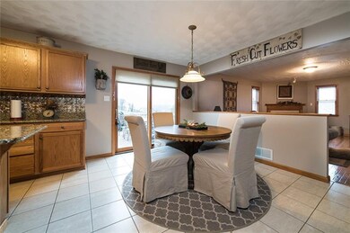 EAT IN KITCHEN WITH ACCESS TO DECK AND OPEN TO THE