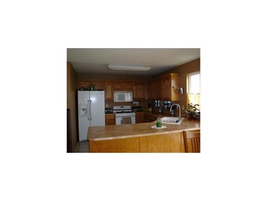 Kitchen. Raised Oak Cabinets