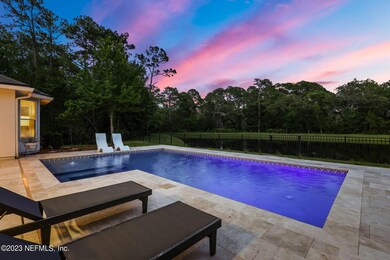 Modern Pool with Spanish tile accents