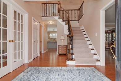 2-Story Foyer!  Beautiful hardwood floors, white t