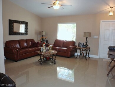 Living room area 24 X 24 Tiles throughout.