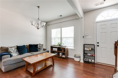 Living room featuring dark hardwood / wood-style f