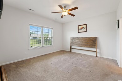 Empty room featuring light colored carpet and ceil
