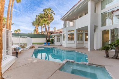 View of pool with a patio, a pool with connected h