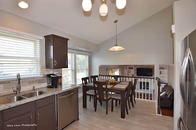 Open Kitchen Flows to Family Room.  Eat In Area, B