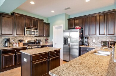 Gorgeous Tile Backsplash & Stainless Appliances