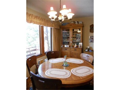Dining area overlooks the lake and water front.