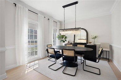 Dining room featuring a wealth of natural light, w