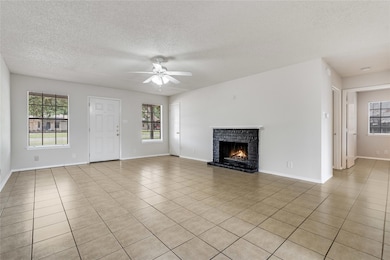 Unfurnished living room with a textured ceiling, 