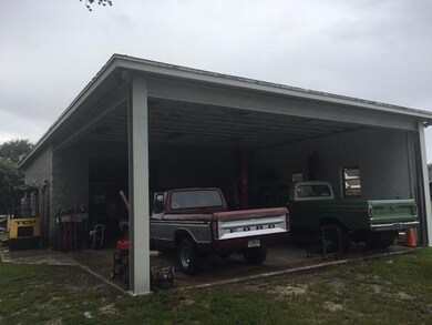 Detached workshop or 2nd garage.