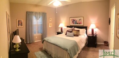 The Master Bedroom is large with a full walk-in cl