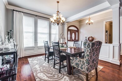 Beautiful Dining Room with Wood Floors and Wood Moldings