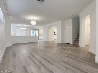 Unfurnished living room featuring light wood-type