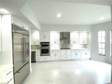 Kitchen with appliances with stainless steel finis