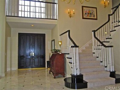 Gallery-sized foyer with 8-foot high double entry 