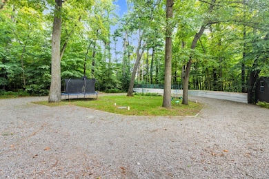 Large Driveway Area and Trampoline