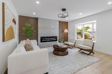 Living room with electric fireplace.