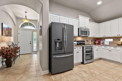 Kitchen featuring stainless steel appliances, vau
