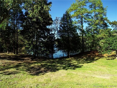 Waterside of parcel with views northwest up creek.