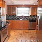 Remodeled, very nice, open kitchen.