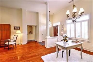 Looking across the formal dinning room and at the 