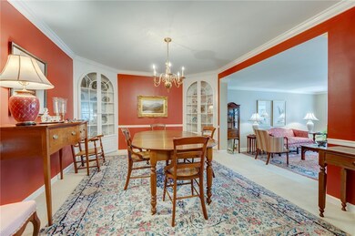 Spacious dining room with corner built-ins and vie