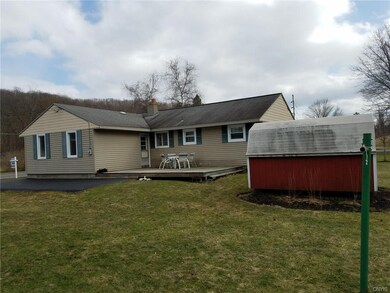 Side yard with deck and shed