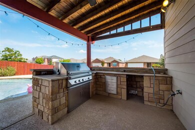 This backyard was made to host barbecues - covered