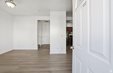 Empty room featuring light wood-style floors and baseboards