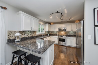 IMMACULATE ALL GRANITE AND STAINLESS KITCHEN WITH 