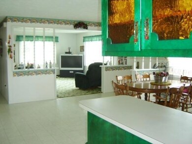Living Room. Kitchen opens to Living...