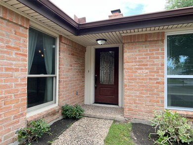 fresh mulch in freshly trimmed & planted flower beds