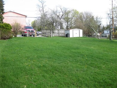 Back Yard With Shed And Off-Street Parking