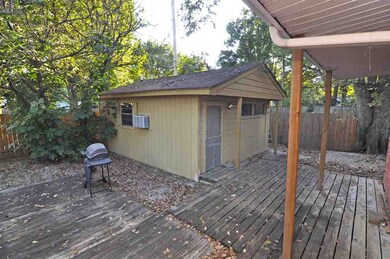The large workshop/storage shed is located in the 