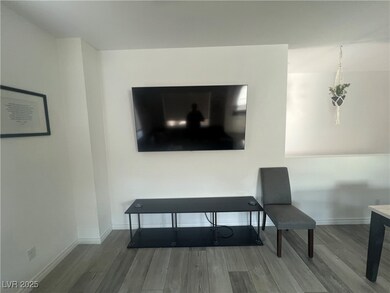 Detailed view of wood finished floors and baseboar