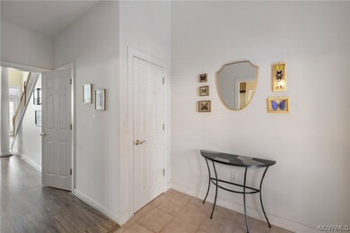 The foyer has ceramic tile floor, coat closet, and