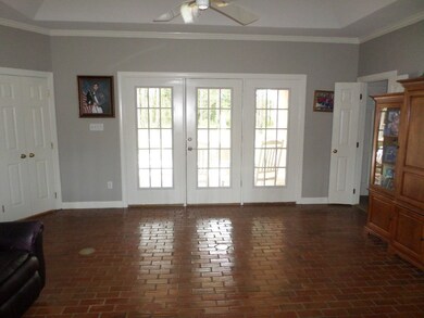 Living Room With Brick Floors
